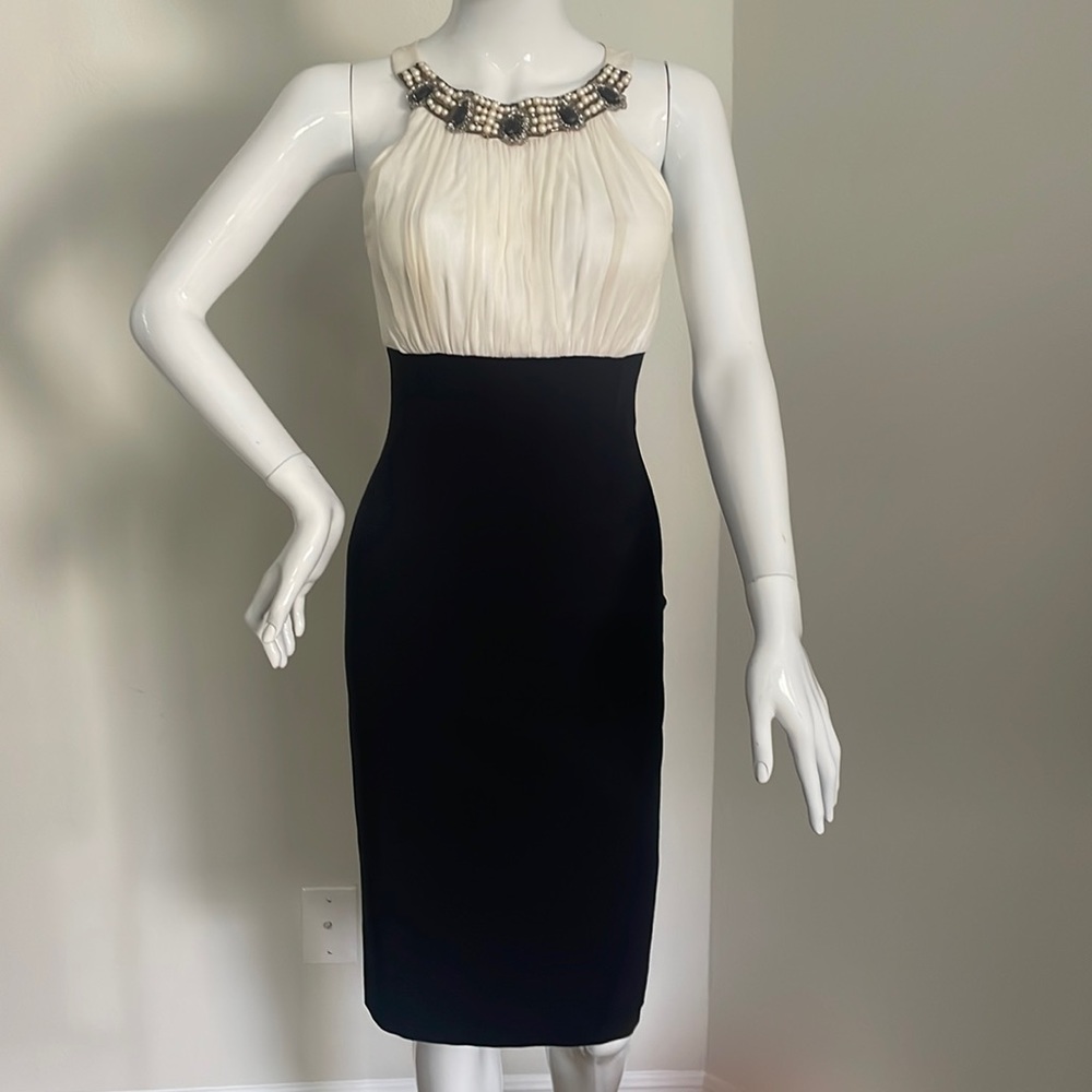 Elegant sleeveless dress, black & cream, w/embellishments at neck. P/S